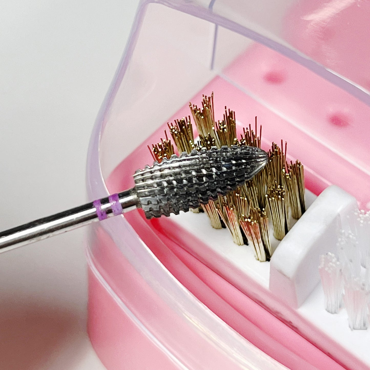 Porte-embout avec nettoyage