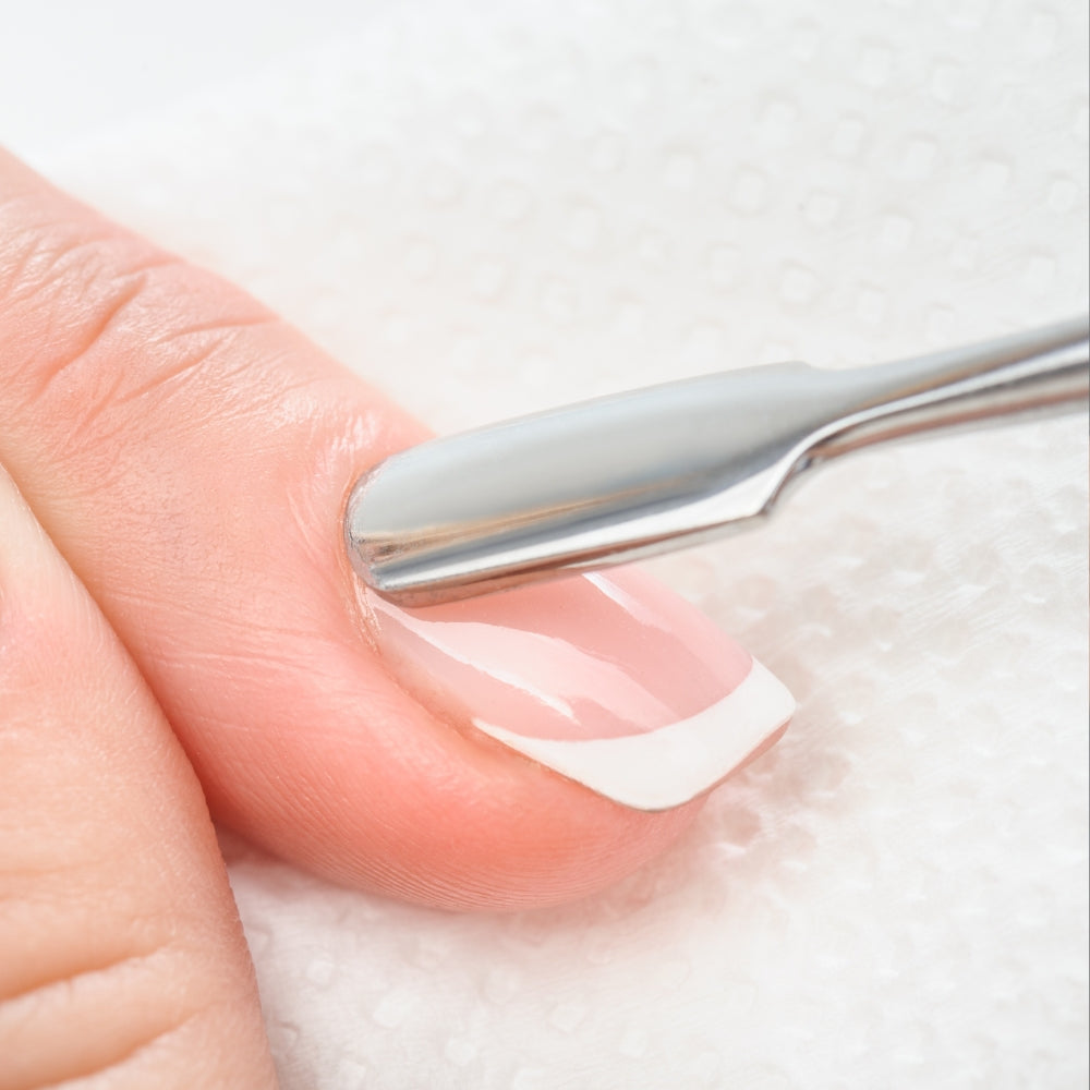 Nagelhautschieber mit Kratzer