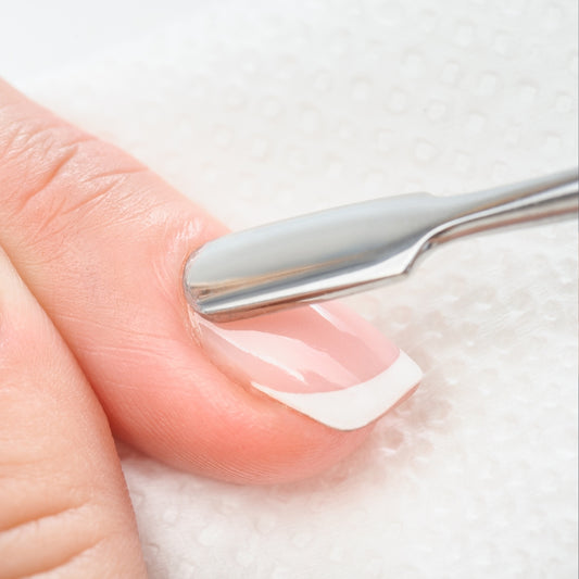 Nagelhautschieber mit Kratzer